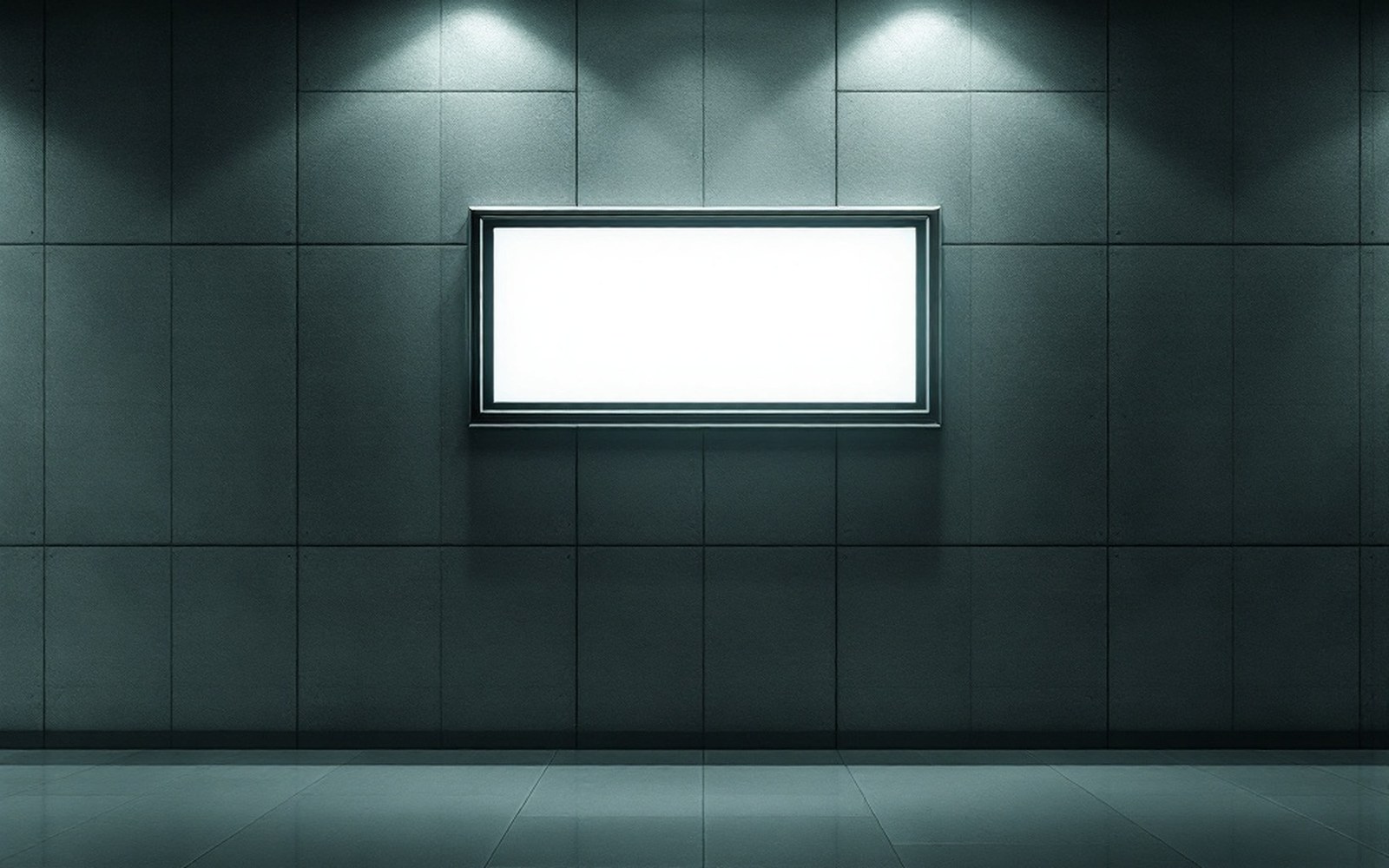 A blank illuminated board in an empty corridor